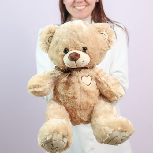 Большой плюшевый медведь